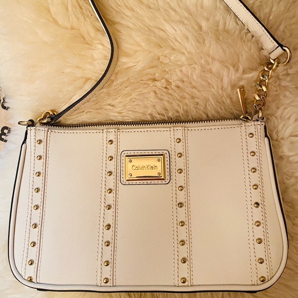 Calvin Klein Handbags - Calvin Klein white leather purse new
